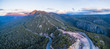 Aerial panorama of Mount Roland Regional Reserve and Olivers road at sunset. Mount Roland, Tasmania, Australia