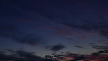 Dark Twilight Sunset Sky Cloudscape Time-lapse 4k Nature Video: Red Clouds Moving On Night Evening Haven. Day To Night Transition