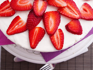 Wall Mural - Homemade chocolate cake with strawberries and white cream