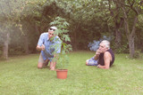 Fototapeta Młodzieżowe - Seniors smoking marijuana and relaxing in the garden