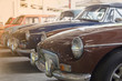 brown retro and classic car in big garage vintage style