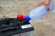 car battery maintenace with distilled water