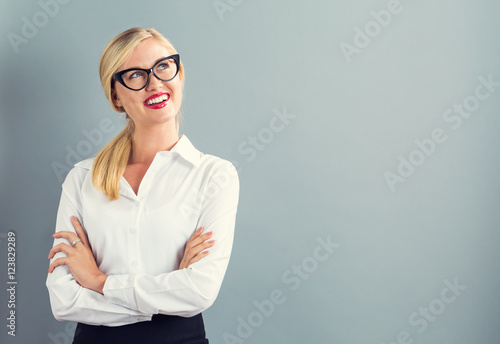 Fotografie, Obraz Young businesswoman in a thoughtful pose