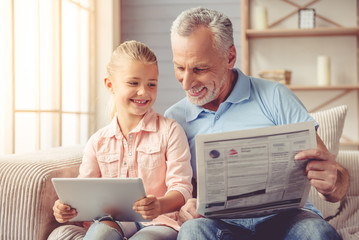 Grandpa and little girl at home