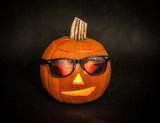 Fototapeta  - Halloween pumpkin with sunglasses