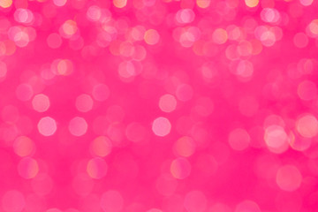 Wall Mural - Bokeh glamour pink background with blurred rainbow lights. Festive background.