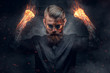 © Fxquadro - Demonic man with burning arms.