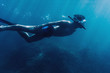 Male diver snorkeling underwater