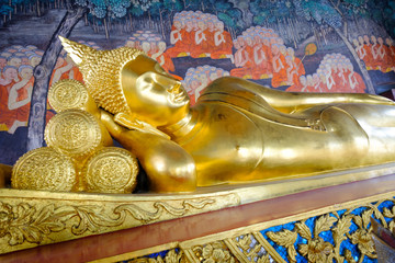 Beautiful of golden Buddha statue and thai art architecture in Wat Bovoranives, Bangkok, Thailand.