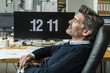 © Westend61 - Mature man taking a nap at his office