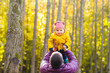 © satura_ - Father and his little son having fun in autumn park