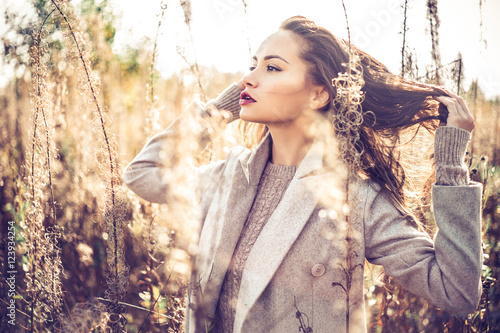 Fotografie, Tablou Fashion beautiful lady in autumn landscape