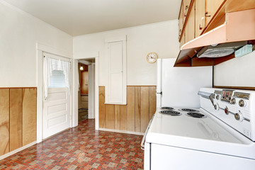 Interior of old style kitchen with linoleum floor