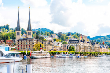 Wall Mural - Cityscape view on the riverside with catholic church in Lucerne city in Switzerland