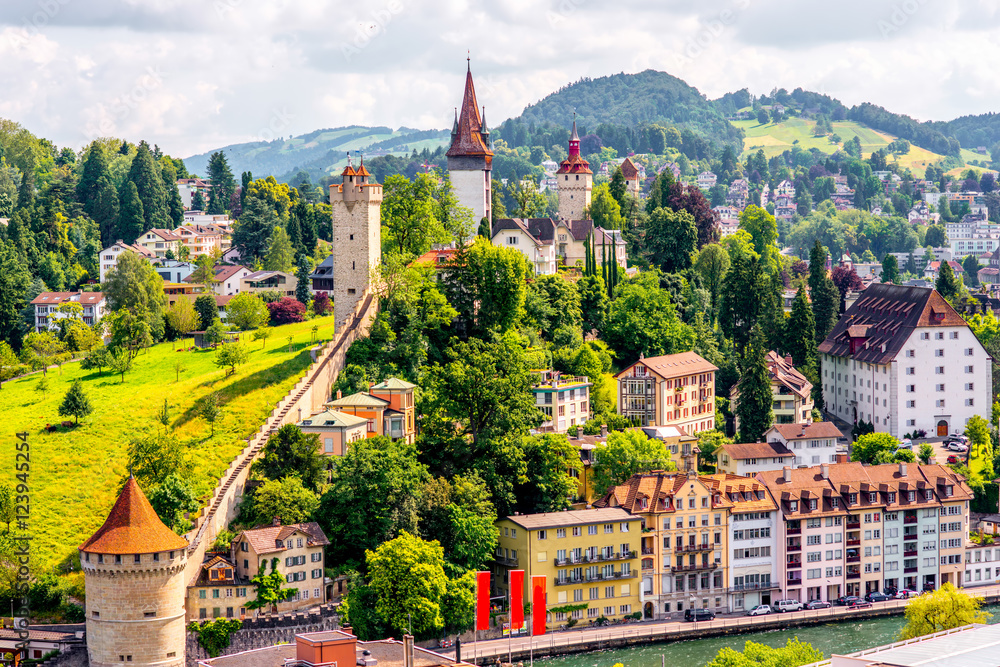 Top view on the old town with fortification wall and towers in Lucerne city in Switzerland - obrazy, fototapety, plakaty 