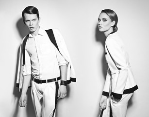 Fashion couple in white suite