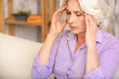 © Yakobchuk Olena - Old woman has terrible headache