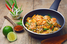 Famous Traditional Thai Food Shrimp Pad Thai, Rice Noodle Stir-fry With Prawns, Tofu And Vegetables On Cooking Pan.