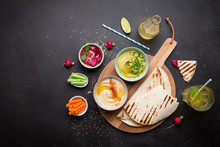 Various Vegetarian Colorful Dips With Pita Bread