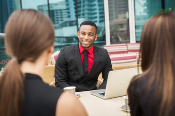 Business people in a cafe.