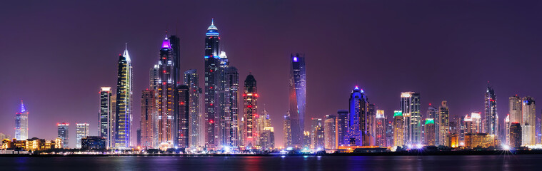 Amazing night panorama of Dubai Marina. Multiple highest skyscrapers of the world with residential buildings, Dubai, United Arab Emirates