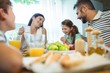 © WavebreakMediaMicro - Smiling parents talking with their daughter at breakfast table