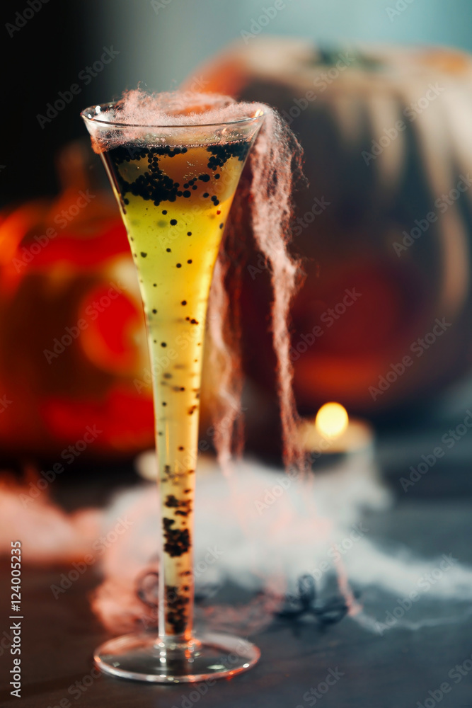 Bright tasty cocktail for Halloween party, close up view
