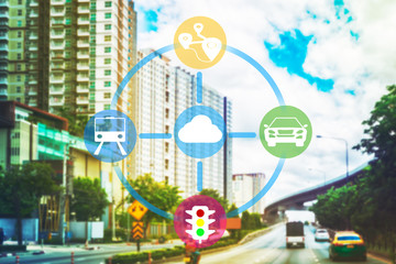 Smart transportation concept. Sharing economy and collaborative consumption. Transportation icons connected to could system against abstract building and street background.