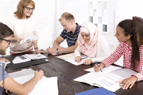 Students making notes Canvas Print