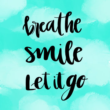 Wall Mural -  - Breathe, smile, let it go inspirational message on blue painted background