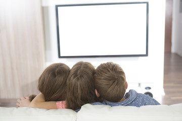 child watching TV at home