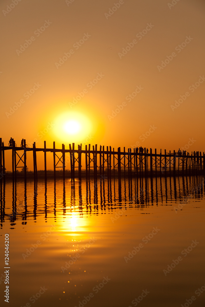 U Bein Bridge at sunset with people crossing Ayeyarwady River, M Stock ...