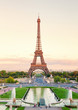© ivanmateev - Eiffel Tower shot from Trocadero at sunset. Pond and gardens on