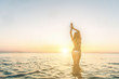 © Davide Angelini - Portrait of a beatiful girl with the perfect body at sunrise on the sea