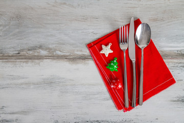 Wall Mural - Christmas And New Year Holiday Table Setting on the red napkin with decorations