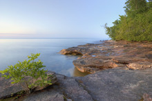 Colourful Rocky Beach At Sunset; Michigan, United States Of America