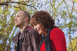 © Designpics - Young Married Couple Walking And Talking Together In A Park; Edmonton, Alberta, Canada