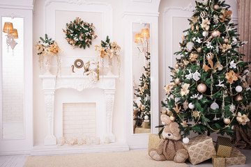christmas background. new year interior design. decorated tree near fireplace in great white living 