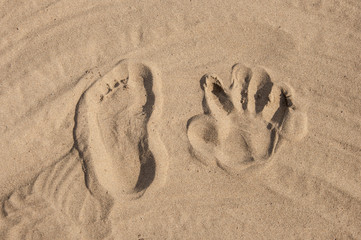 Footprints in sand at the Beach