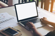 © Masato - Business girl typing keyboard computer laptop work from home or office. Her using laptop online to find search data and working. Monitor notebook blank screen copy space for your text.