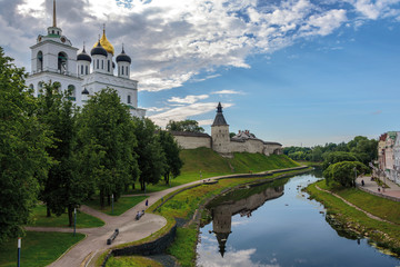 Wall Mural - View of the Pskov Kremlin from the bridge through the river Pskova