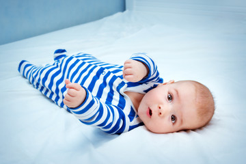 Wall Mural - Cute little baby in bed