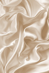 Wall Mural - Smooth elegant golden silk as wedding background. In Sepia toned