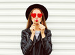 © rohappy - Fashion portrait pretty sweet young woman with red lips making a
