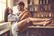 © georgerudy - Sexy young couple in kitchen
