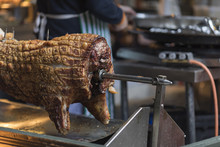 Hog Roast On A Spit At A Street Market