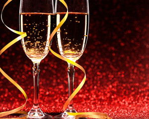 Wall Mural - glasses of champagne with yellow holidays ribbons