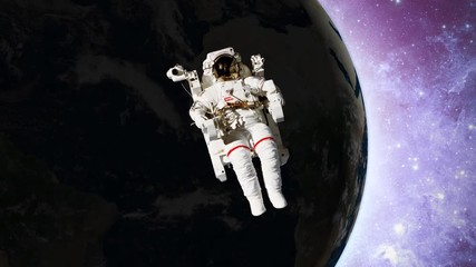 Wall Mural - astronaut in open space in front of earth
