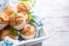 Delicious Homemade Coconut Cinnamon Muffins And Mint Leafs On Old White Tray. Healthy Food Concept With Copy Space.