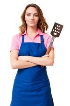 Pretty Blond Woman Wife Mother Girlfriend Bbq Grill Chef In Blue Apron With Arms Crossed Clutching Barbecue Spatula Isolated On White Background